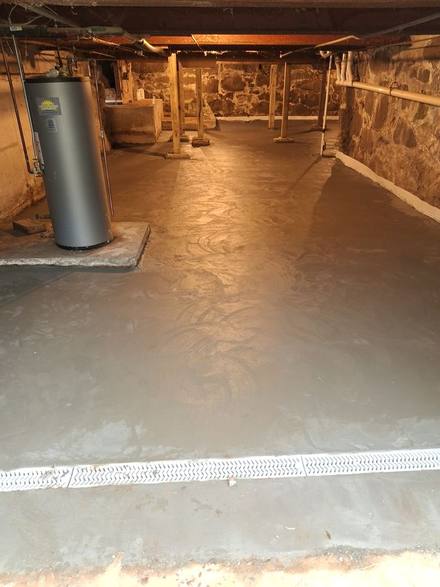 The same basement with a new poured concrete floor