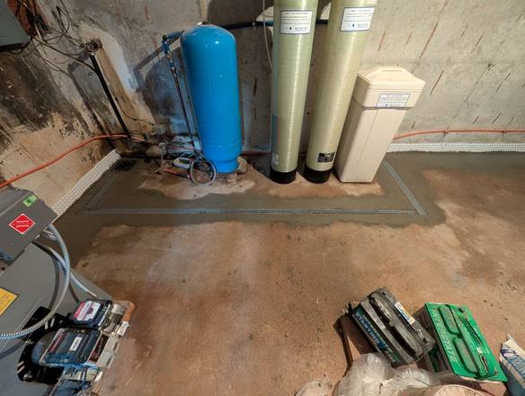 Same corner with the drain capped in new concrete